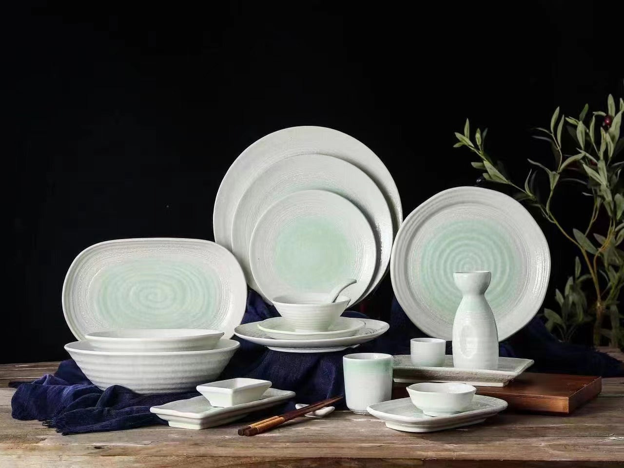 White and celadon porcelain dinnerware collection