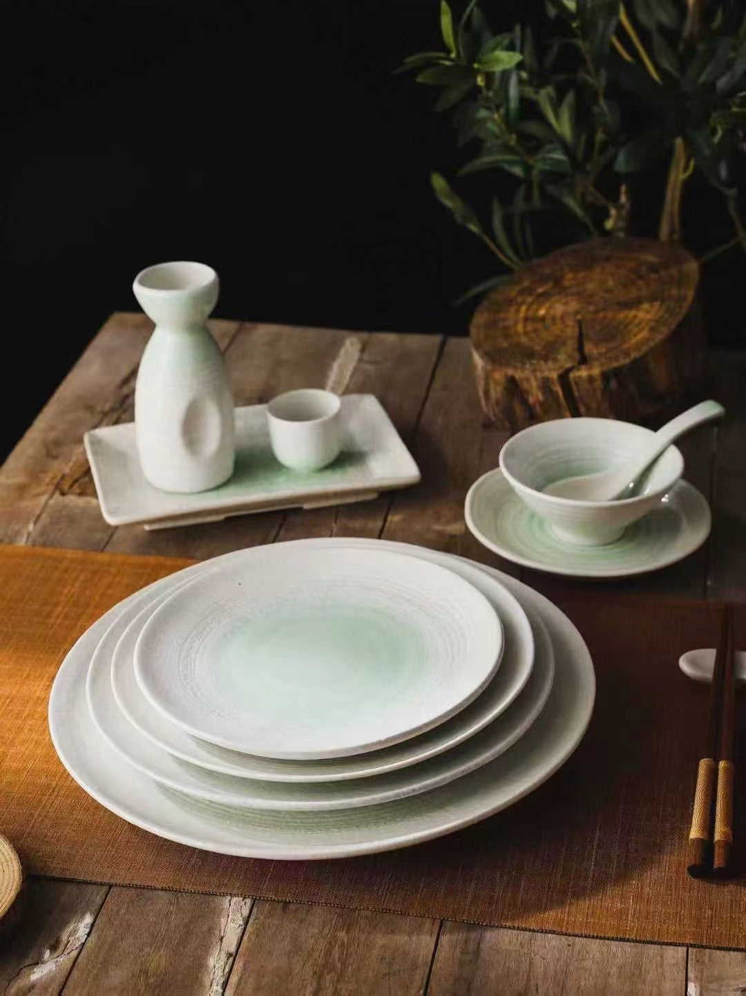 Elegant porcelain table setting on a wooden table